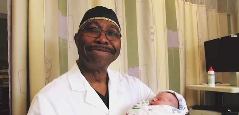The doctor who sings Happy Birthday to EVERY baby he delivers