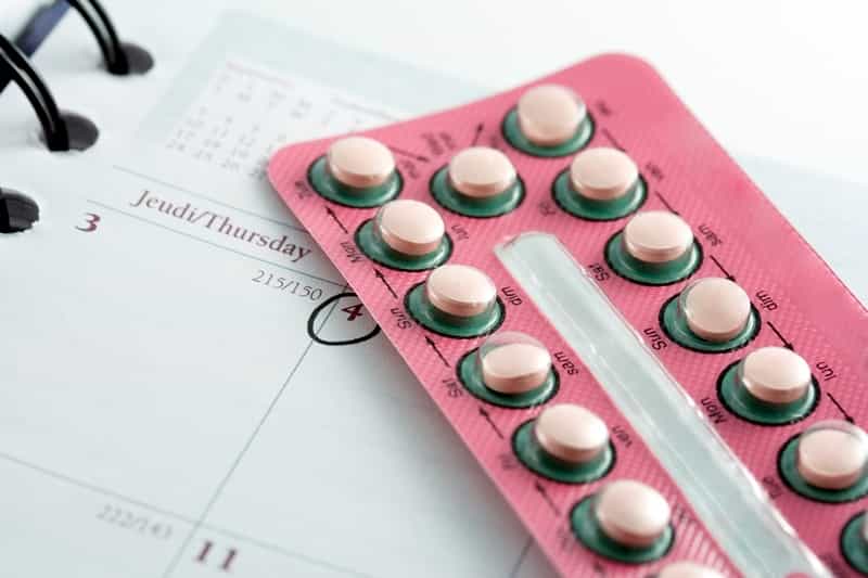 This pregnant burlesque dancer dressed up as a giant birth control packet