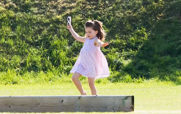 These christening photos prove Princess Charlotte is the most adorable big sister