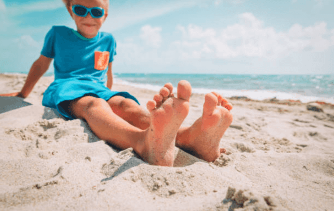 Mum shares handy tip to stop sand sticking to feet on the beach
