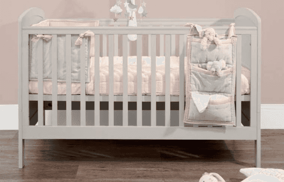 WIN a gorgeously cosy wood panelled cot and playmat bundle worth over €500