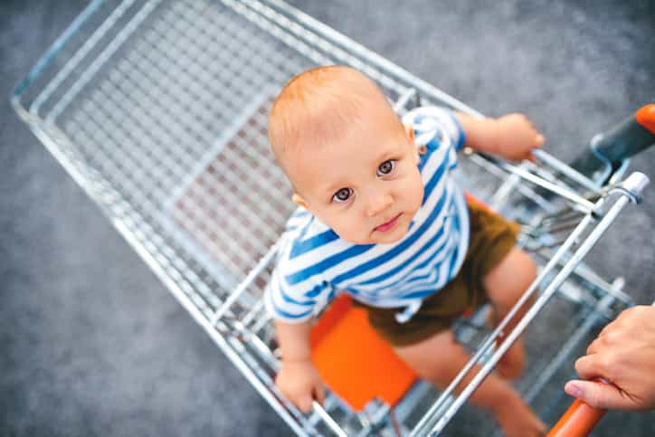 Mum angered after shop worker takes her child out of shopping trolley Mum angered after shop worker takes her child out of shopping trolley