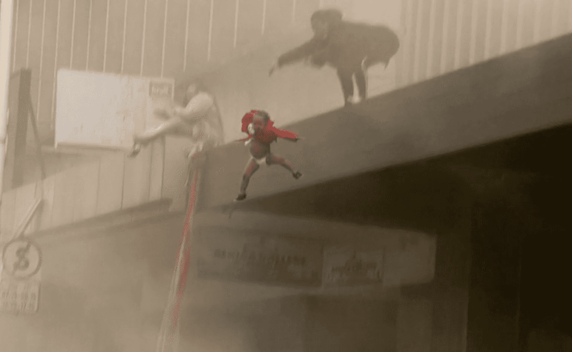 Mother throws baby off burning building into strangers’ arms
