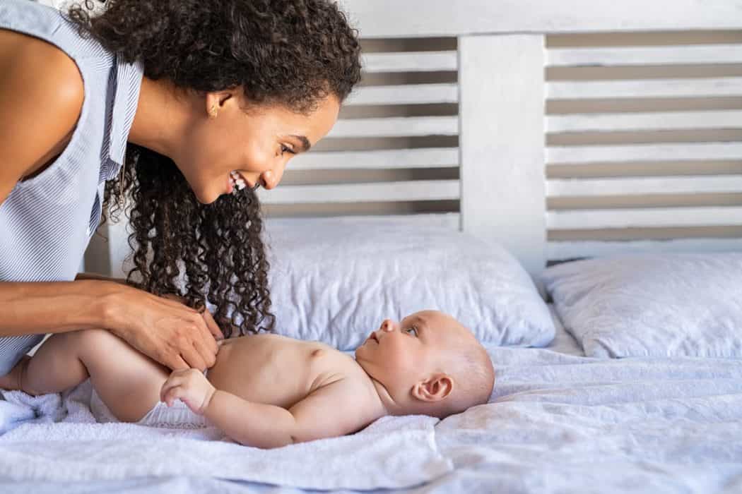Expert claims parents should stop lifting baby’s legs when changing their nappy