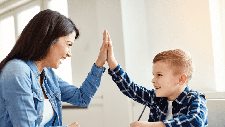 Should parents be high-fiving their children? Here’s what experts are saying Should parents be high-fiving their children? Here’s what experts are saying