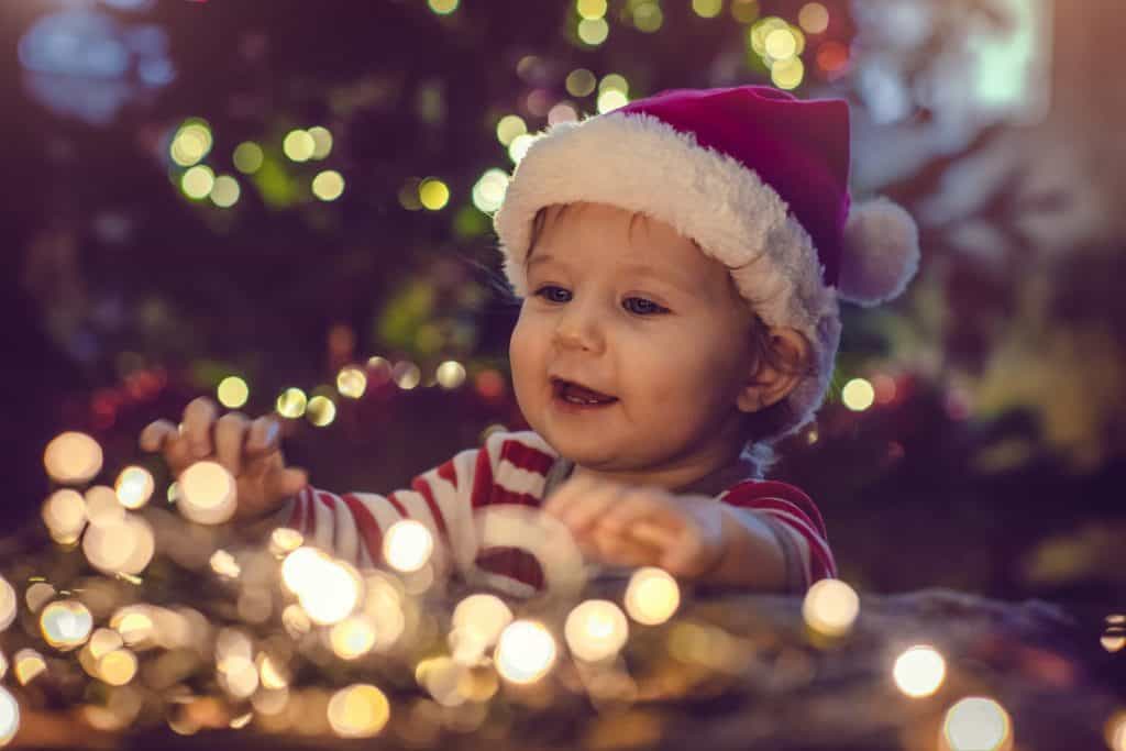 Two cute ways to remember how little your child was at their first Christmas