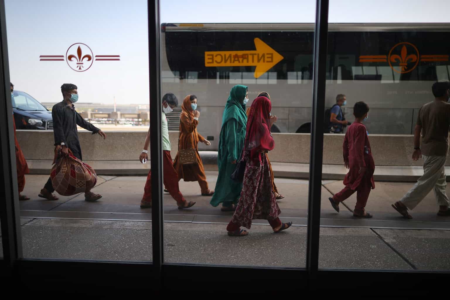 Baby boy lost in Afghan airport finally reunited with his family
