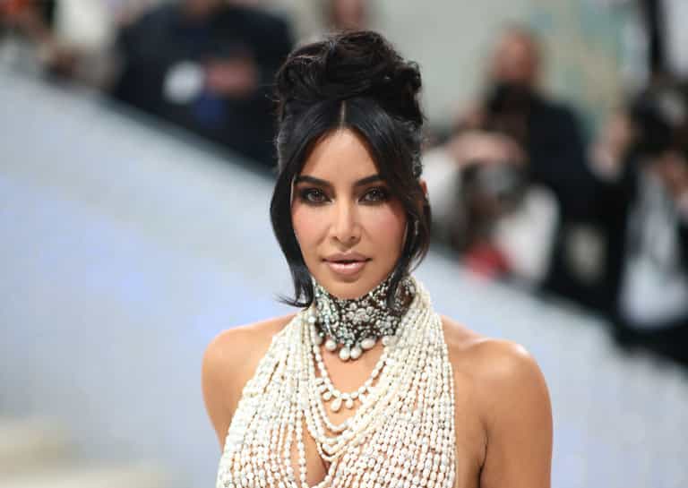Kim Kardashian says she cries herself to sleep over raising her kids alone