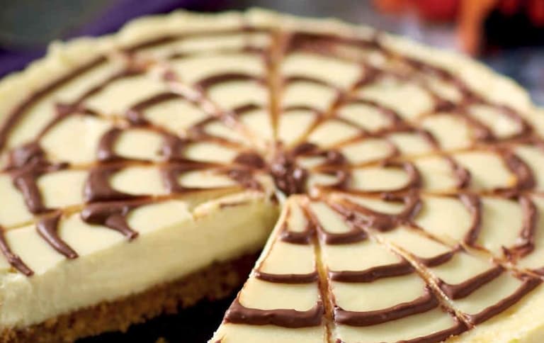 Trick or treat yourself with this Cobweb Cheesecake Recipe Trick or treat yourself with this Cobweb Cheesecake Recipe