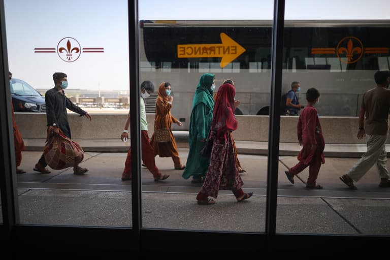 Baby boy lost in Afghan airport finally reunited with his family Baby boy lost in Afghan airport finally reunited with his family