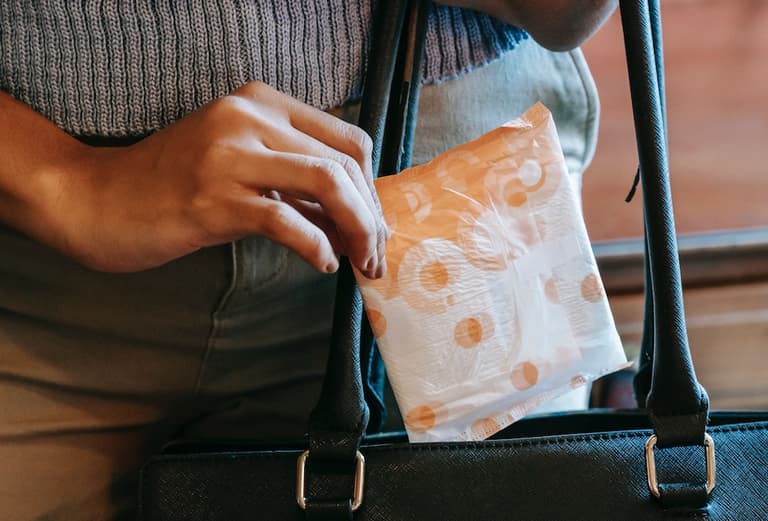 My boss called me out for carrying a sanitary towel to office bathroom- is she wrong? My boss called me out for carrying a sanitary towel to office bathroom- is she wrong?