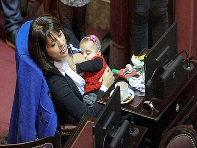 Woman breastfeeds at work, Internet freaks out Woman breastfeeds at work, Internet freaks out