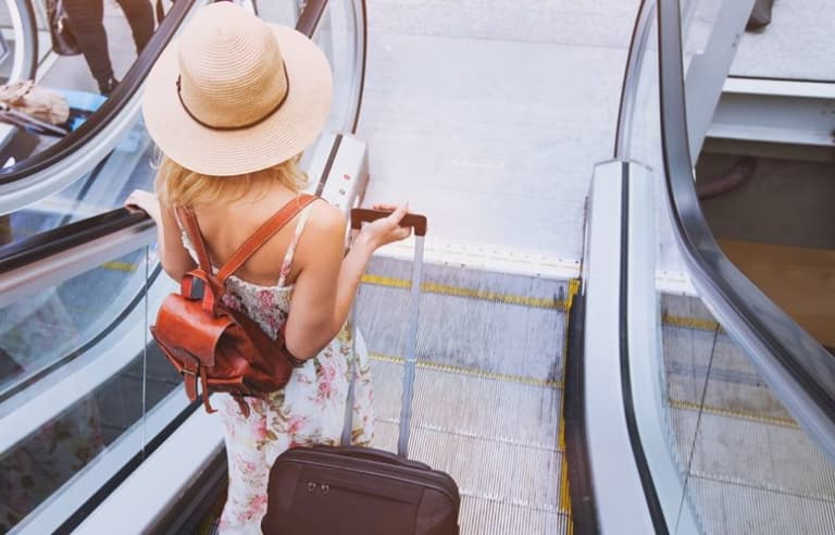 Woman stopped at passport control for looking too young for her age Woman stopped at passport control for looking too young for her age