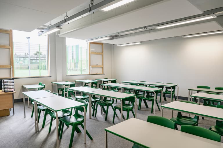 School bans pupils from hugging and high-fiving School bans pupils from hugging and high-fiving