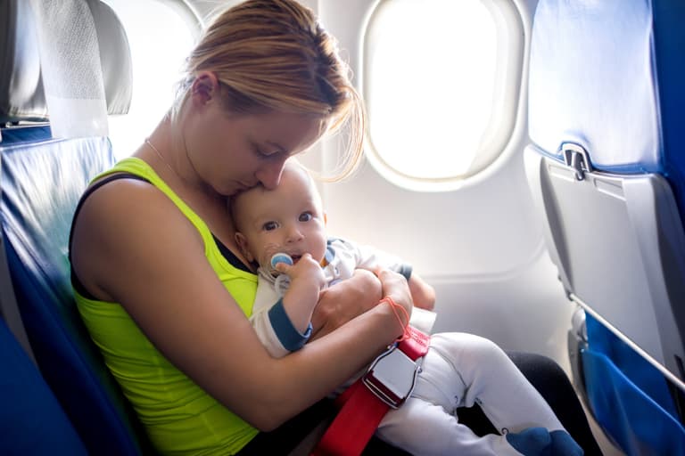 Single mum left in tears after airline staff said she could not fly alone with her kids Single mum left in tears after airline staff said she could not fly alone with her kids