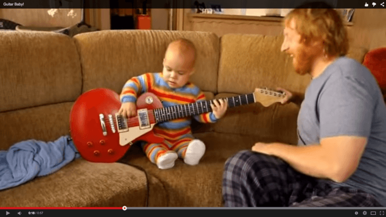 WATCH: This cute little baby playing guitar WATCH: This cute little baby playing guitar