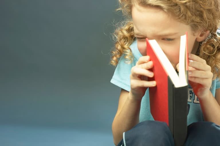 A young girl is told to stop reading on the school bus because it’s dangerous A young girl is told to stop reading on the school bus because it’s dangerous