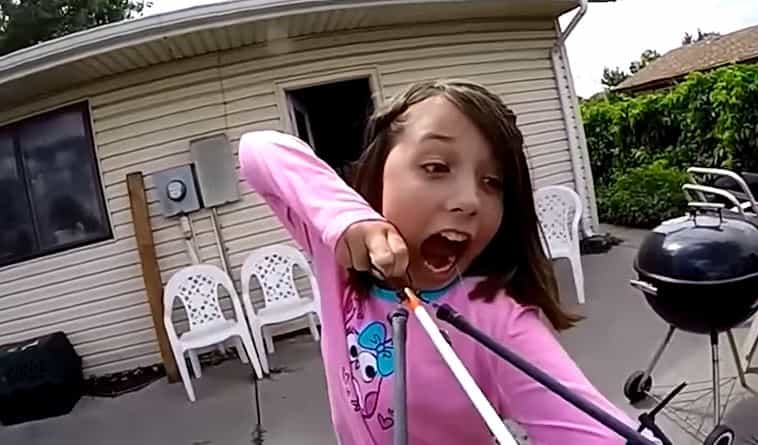 This girl just shot her wobbly tooth out with a sling bow This girl just shot her wobbly tooth out with a sling bow