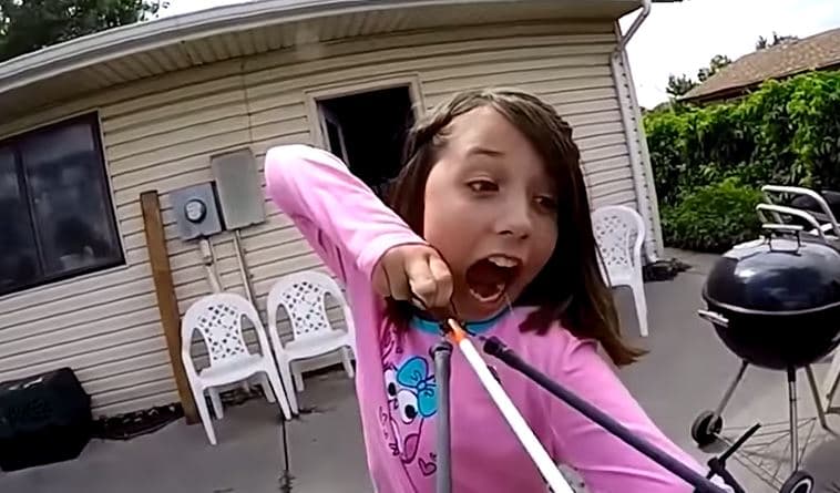 This girl just shot her wobbly tooth out with a sling bow This girl just shot her wobbly tooth out with a sling bow