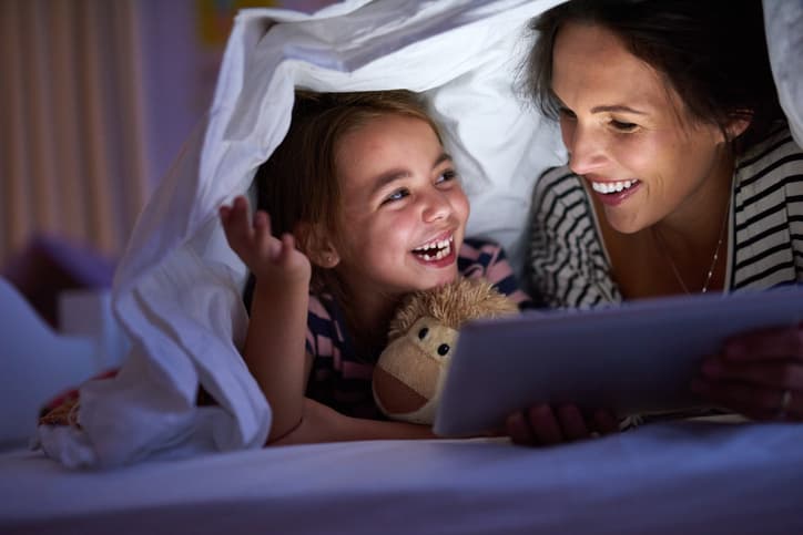 Read bedtime stories from a book, not a screen, says expert Read bedtime stories from a book, not a screen, says expert