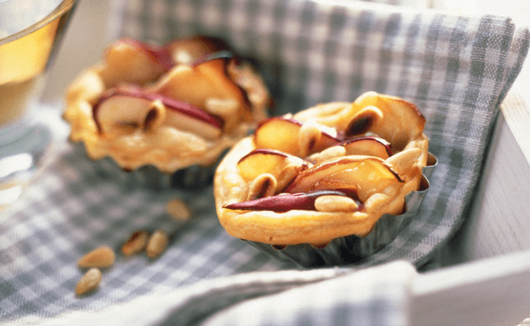 These apple and Parmesan tartlets are a fancy snack the kids will wolf down too These apple and Parmesan tartlets are a fancy snack the kids will wolf down too