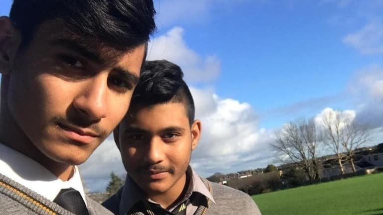 Khan brothers get a standing ovation at school after reprieve in deportation case Khan brothers get a standing ovation at school after reprieve in deportation case