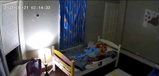 Creepy intruder filmed climbing into bedroom of two young girls as they slept Creepy intruder filmed climbing into bedroom of two young girls as they slept