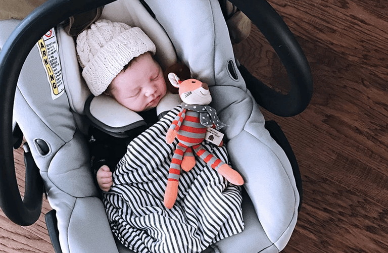 Turns out, we have all been carrying baby car seats the completely wrong way Turns out, we have all been carrying baby car seats the completely wrong way