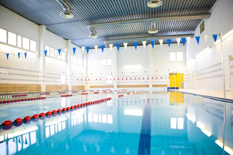 Swim coach arrested as Gardaí launch investigation into hidden dressing room cameras Swim coach arrested as Gardaí launch investigation into hidden dressing room cameras