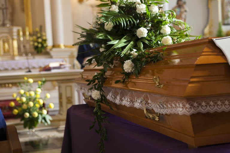 Presumed-dead woman bangs on own coffin during funeral to be let out Presumed-dead woman bangs on own coffin during funeral to be let out