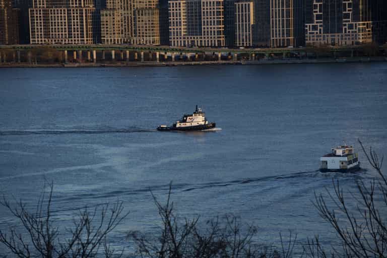 Woman and child killed as boat capsizes in New York Woman and child killed as boat capsizes in New York