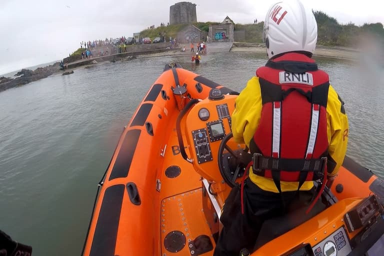 Young girl shaken after paddle-board is blown out to sea Young girl shaken after paddle-board is blown out to sea