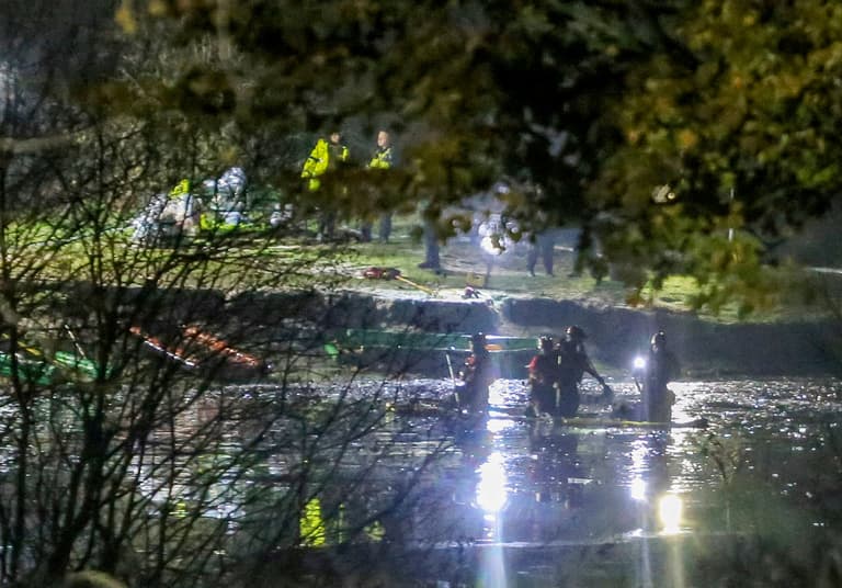 Three boys die after falling through ice while playing on frozen lake Three boys die after falling through ice while playing on frozen lake