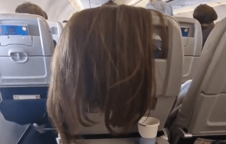 Woman left stunned after plane passenger drapes hair over back of her seat Woman left stunned after plane passenger drapes hair over back of her seat