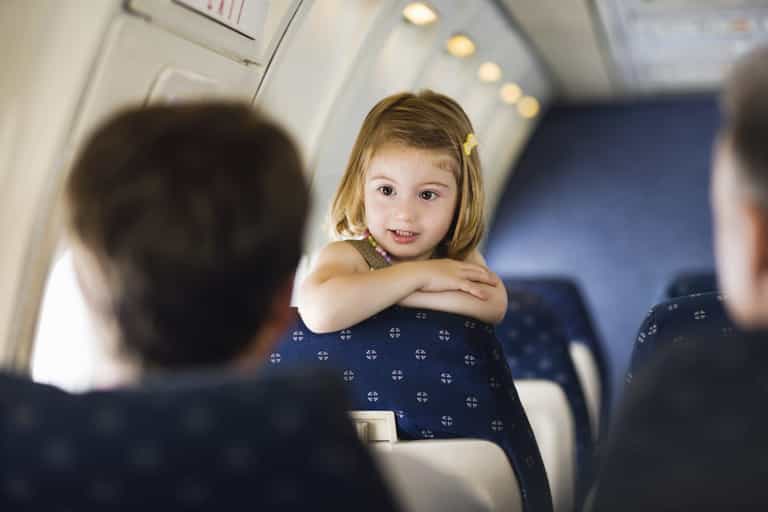 Parents criticised after letting their child use plane as ‘jungle gym’ Parents criticised after letting their child use plane as ‘jungle gym’