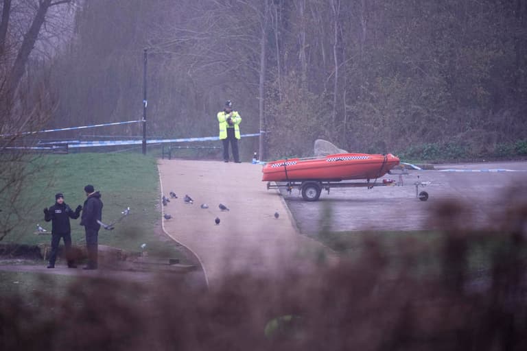 Two children feared dead after falling through frozen lake Two children feared dead after falling through frozen lake